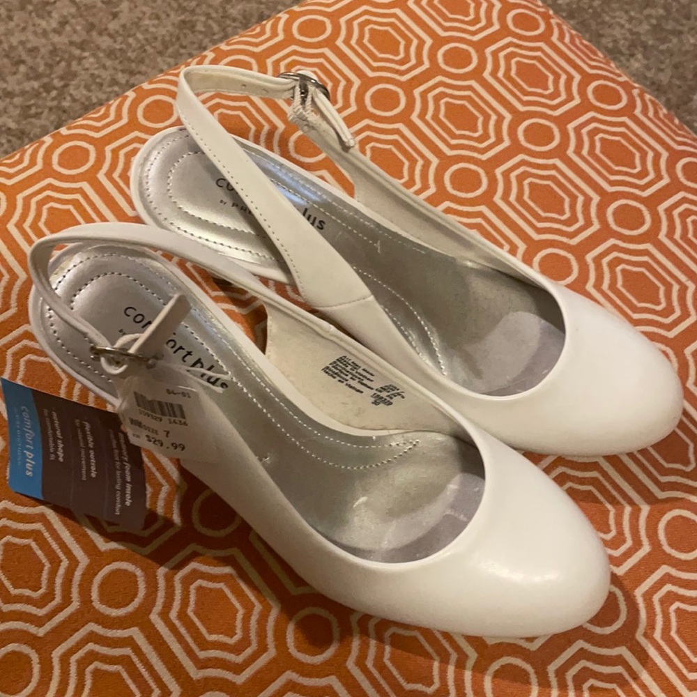 Brand new with tags-no box. Size 7